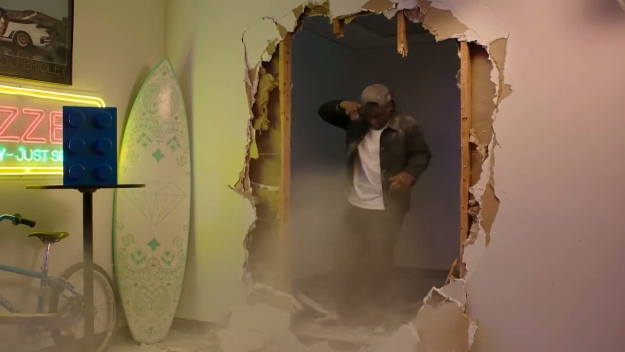 The Mob - Launch Video: The Mob group chat lights up a phone, a wall bursts open and a man steps through the hole into the studio